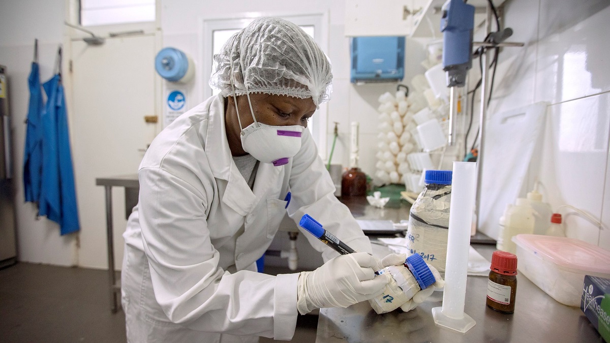 A woman technician performs fishery quality control in a lab in Port Victoria, Seychelles.